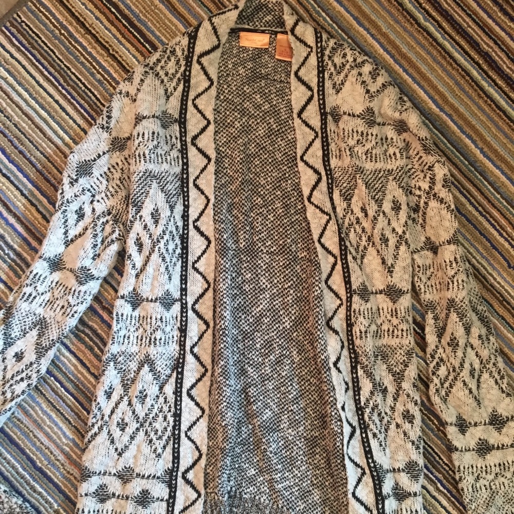 Bret with black cardigan